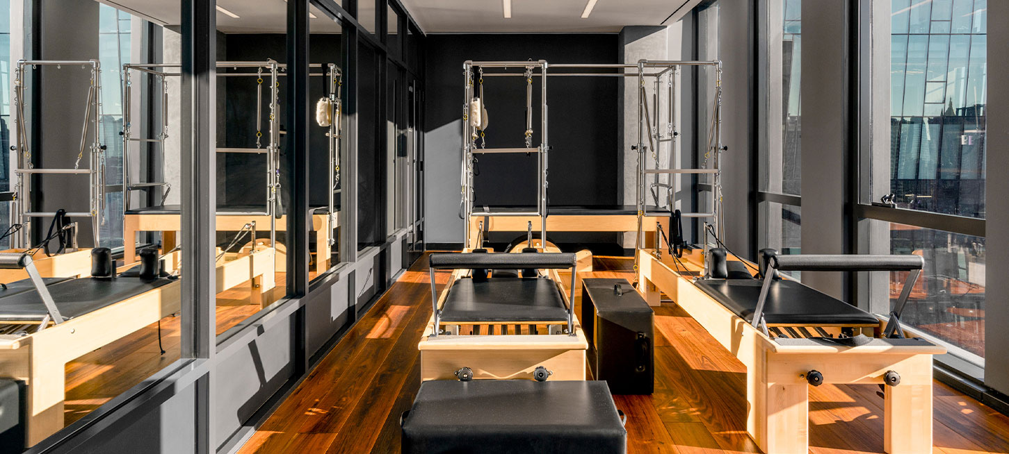 Luxury pilates studio at The Copper apartments in Murray Hill, providing residents a well-equipped space for workouts. 
