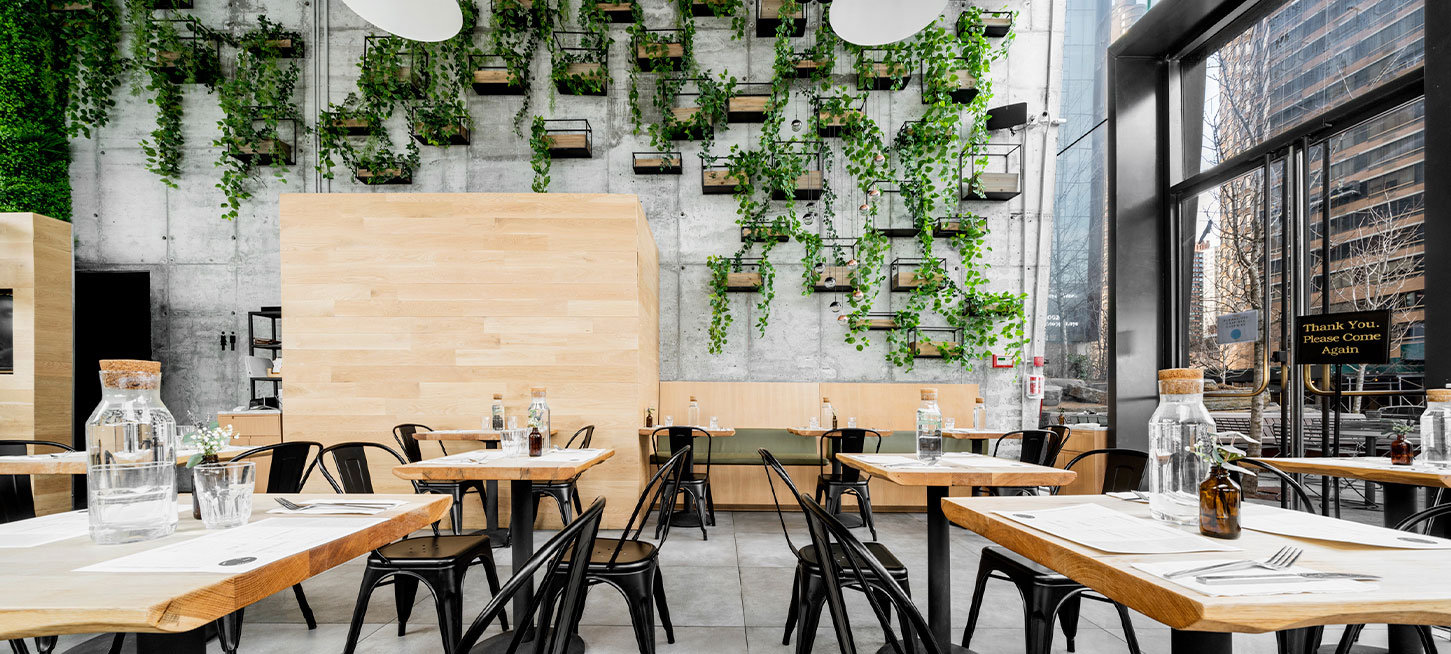 Restaurant with signature drinks and gourmet food for residents at The Copper apartments in Murray Hill.