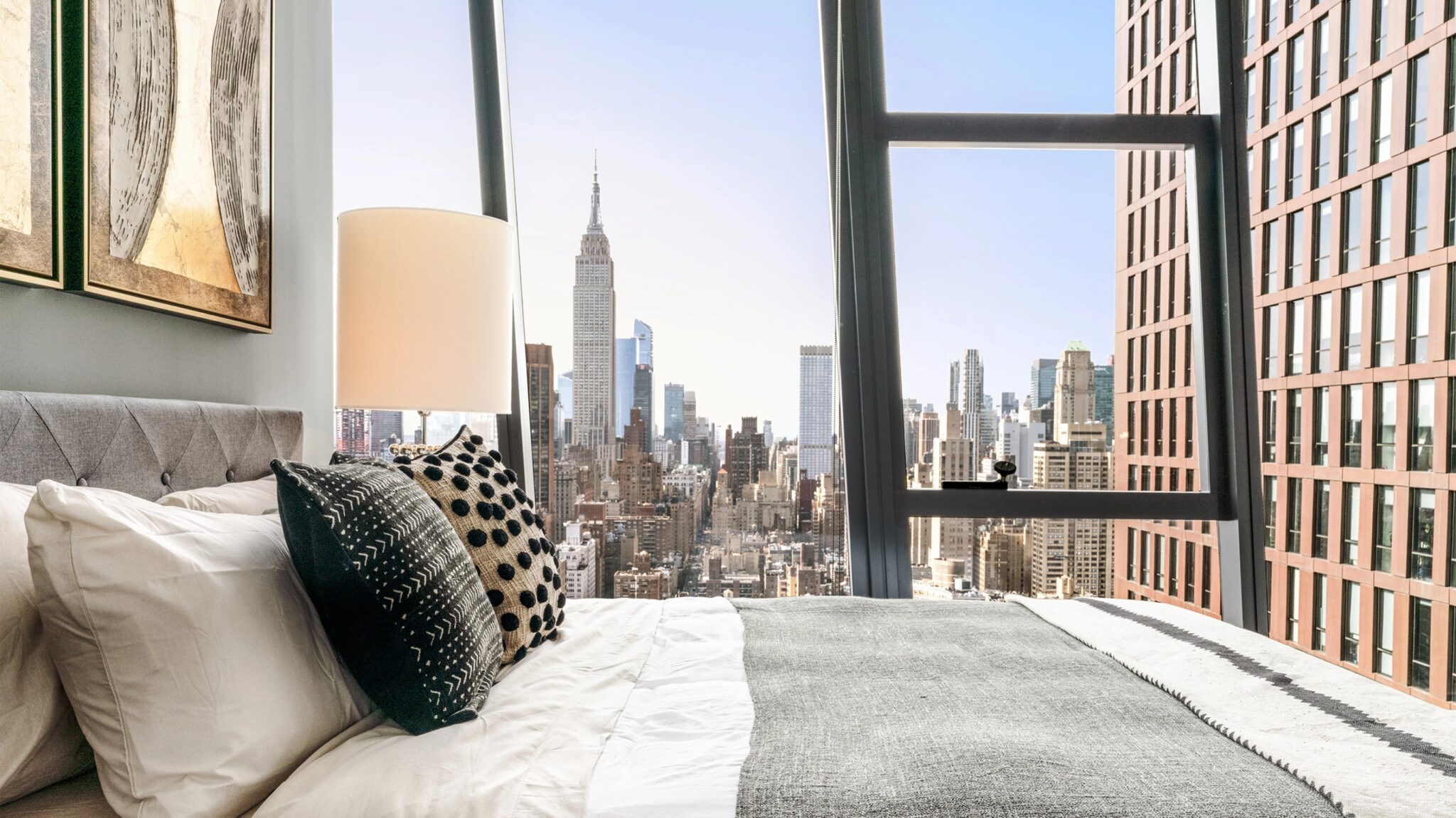 Modern bedroom at The Copper apartment in Murray Hill with natural light and breathtaking Manhattan view.