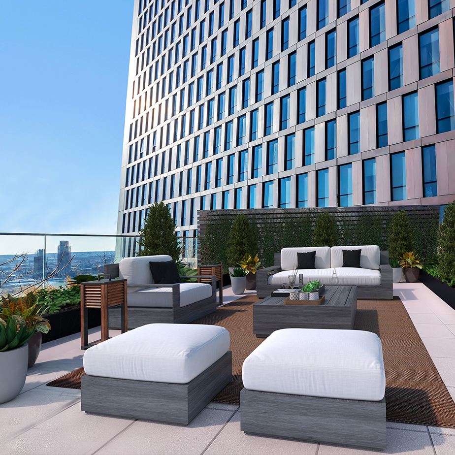 Luxurious spacious terrace at The Copper apartments in Murray Hill, with elegant seating and stunning East River views.