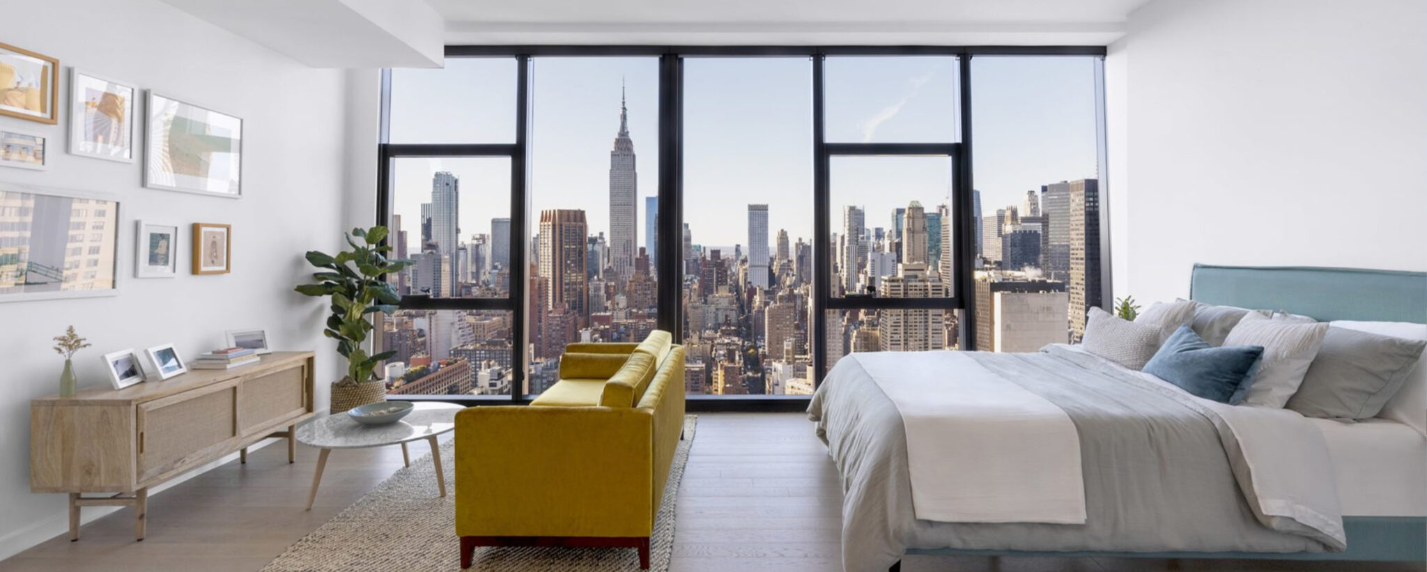 Modern studio at The Copper apartments in Murray Hill with floor-to-ceiling windows and breathtaking NYC skyline views.